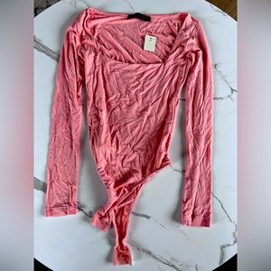 Francesca's Collections Pink Long Sleeve Bodysuit